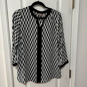 Chicos Top size 0 Which is a small NWT